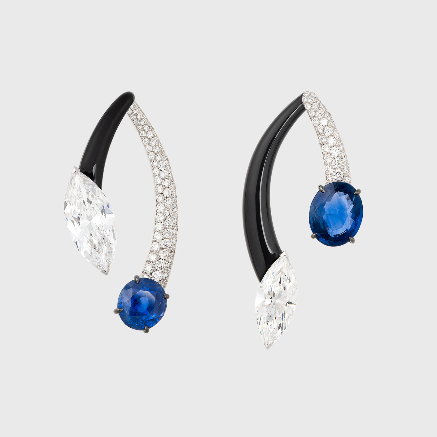 White gold mismatched jacket earrings with marquise white diamonds, round blue sapphires and black enamel