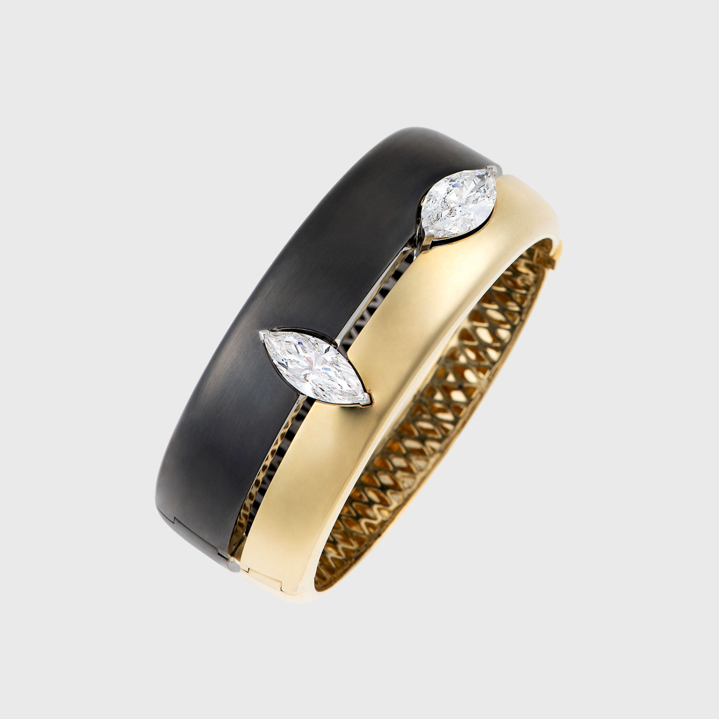 Yellow and blackened white gold cuff bracelet with marquise white diamonds