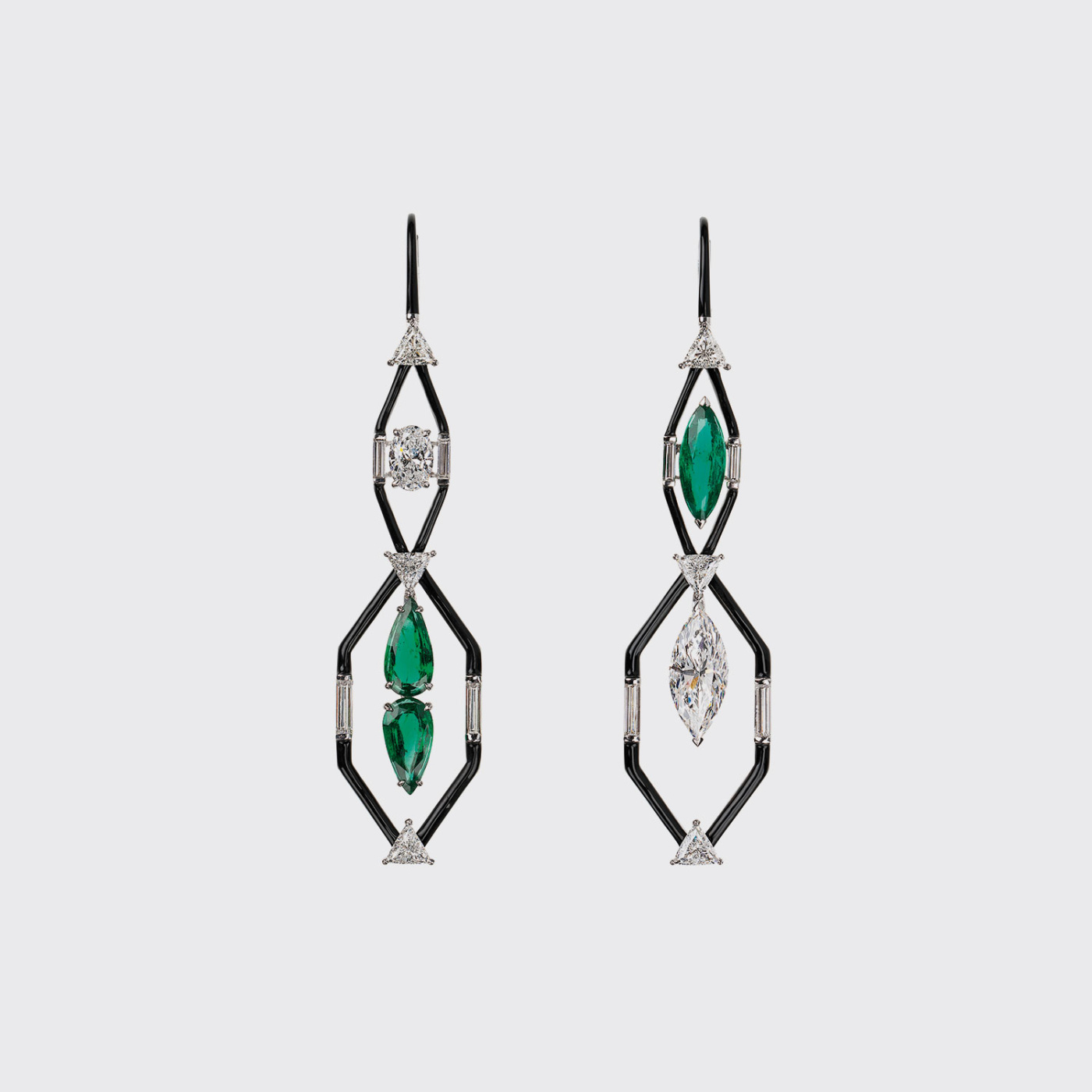 White gold mismatched long earrings with emeralds and white diamonds and black enamel