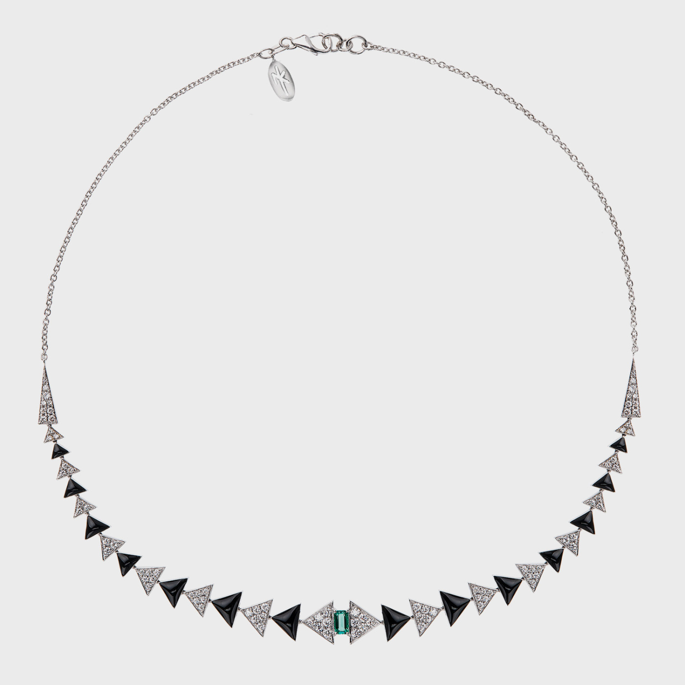 White gold necklace with white diamonds, emerald and black enamel