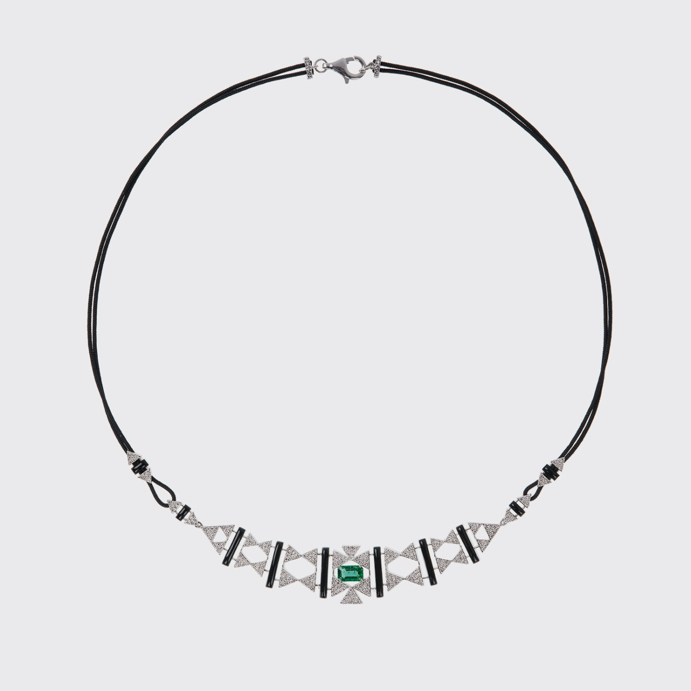 White gold necklace with white diamonds, emeralds and black enamel