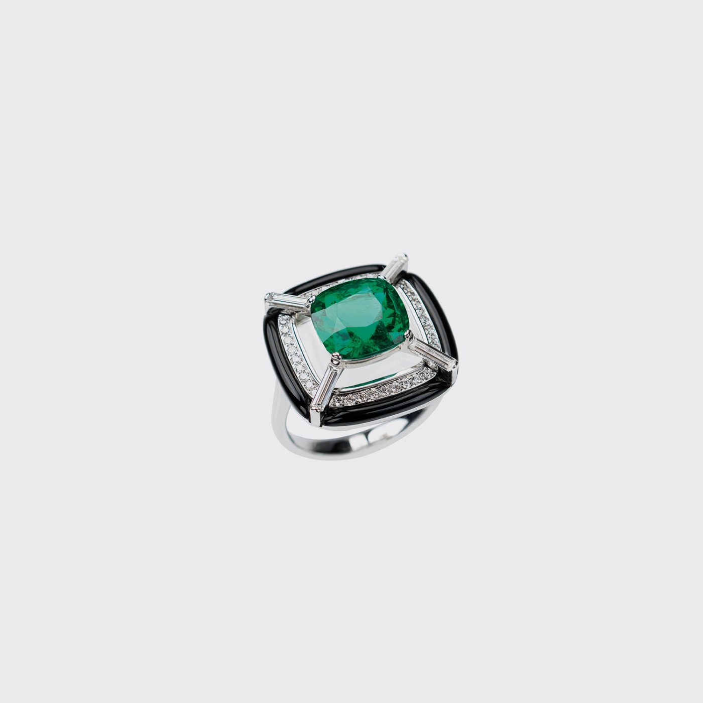 White gold ring with emerald and white diamond baguettes and black enamel