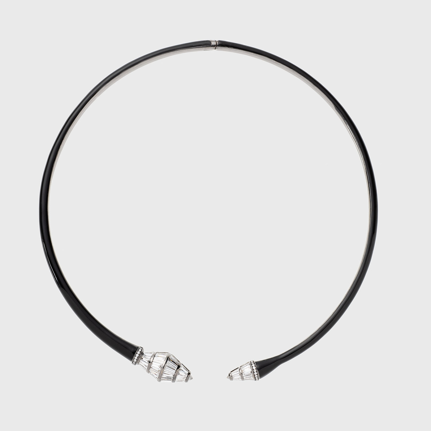 White gold necklace with tapered baguette white diamonds and black enamel