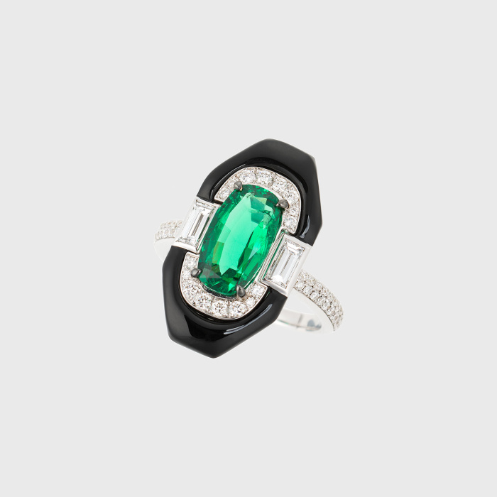 White gold ring with oval emerald, emerald cut white diamonds, paved white diamonds and black enamel