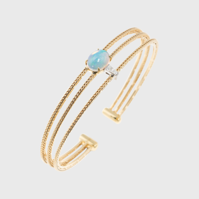 Yellow gold bangle bracelet with opal and white diamonds