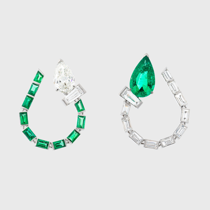 White gold mismatched earrings with pear shape white diamond and emerald, emerald and white diamond baguettes