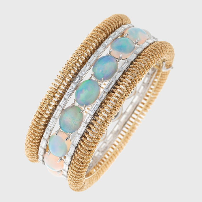 Yellow gold cuff bracelet with opals and white diamonds