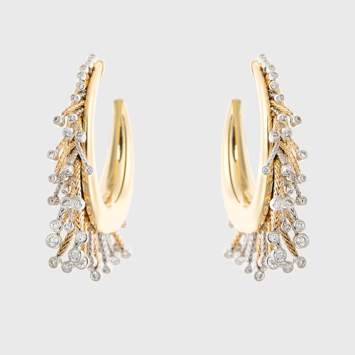 Yellow gold hoop earrings with white diamonds and emeralds