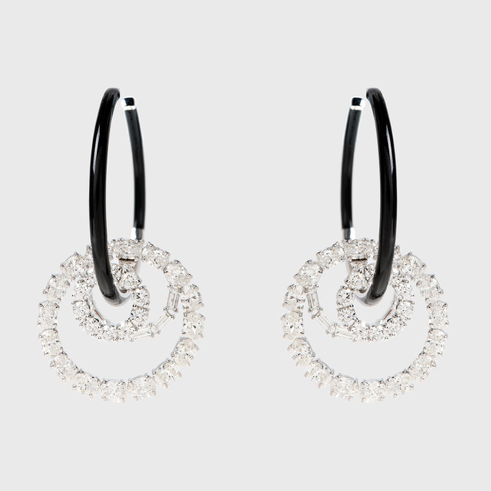 White gold hoop earrings with oval and baguette white diamonds and black enamel