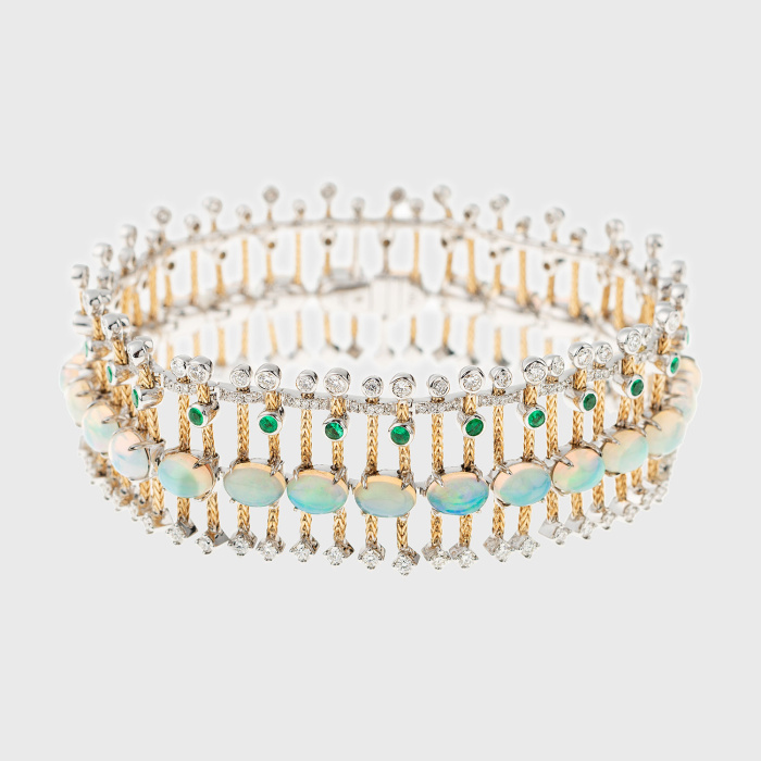 Yellow gold bracelet with white diamonds, opals and emeralds
