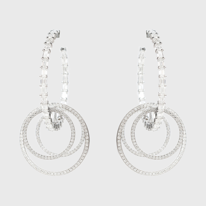 White gold hoop earrings with emerald cut white diamonds, tapered and paved white diamonds