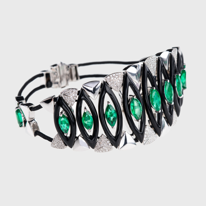 White gold cord bracelet with emeralds, white diamonds and black enamel