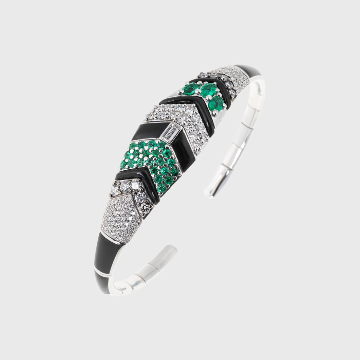 White gold bangle bracelet with white diamonds and emeralds