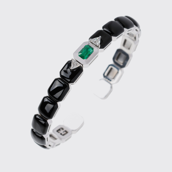 White gold bangle bracelet with emerald, white diamonds and black enamel
