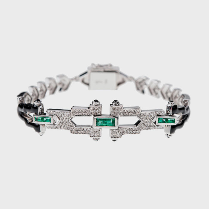 White gold bracelet with white diamonds, emeralds and black enamel
