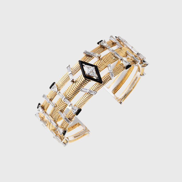 Yellow gold chain cuff bracelet with trillion white diamond, white diamond baguettes and black enamel