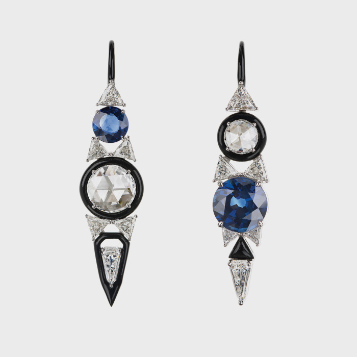 White gold mismatched earrings with blue sapphires, round, trillion, tapered baguette white diamonds and black enamel