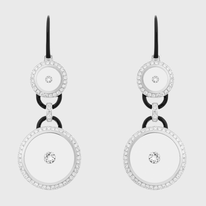 White gold earrings with round white diamonds in translucent enamel and black enamel