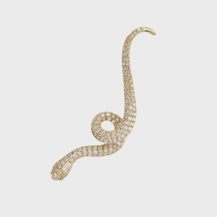 Yellow gold snake earcuff with white diamonds and black diamonds