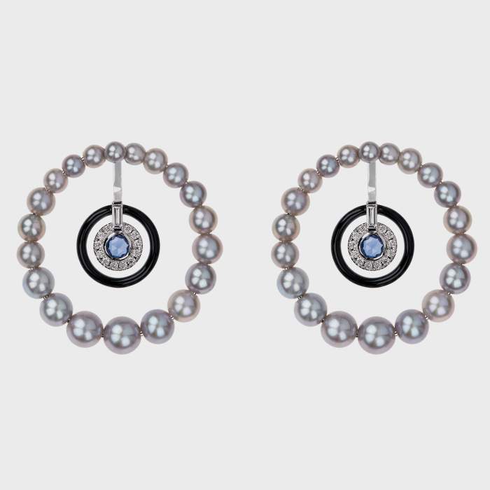 White gold hoop earrings with white diamonds, blue sapphires, silver pearls and black enamel