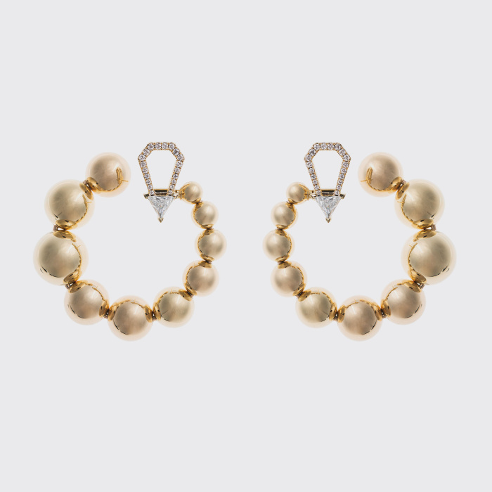 Yellow gold hoop earrings with trillion white diamonds