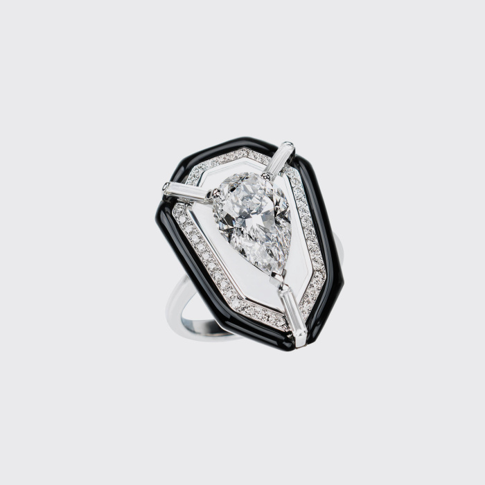 White gold ring with pear shape white diamond set in translucent enamel and black enamel