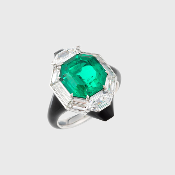 White gold ring with emerald, white diamond baguettes, cut cornered trillion white diamonds and black enamel