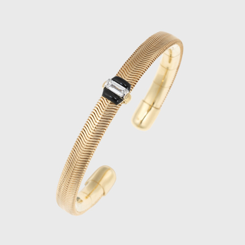 Yellow gold chain bangle bracelet with white diamond baguette and black enamel