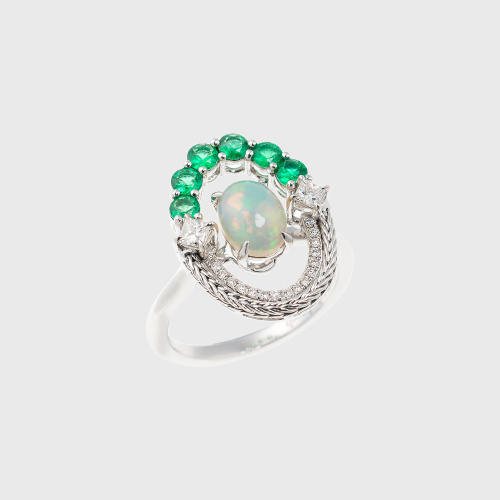 White gold ring with opal, white diamonds and emeralds
