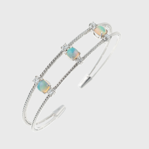 White gold bangle bracelet with opals and white diamonds