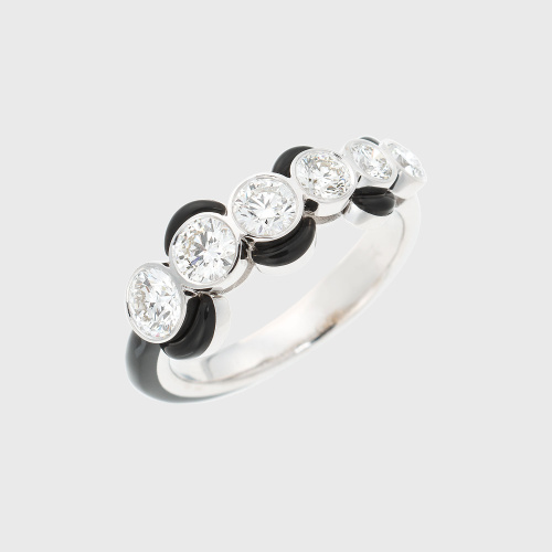 White gold ring with oval white diamonds and black enamel