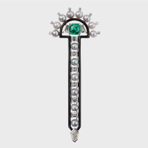 White gold brooch with white diamonds, emerald, silver pearls and black enamel