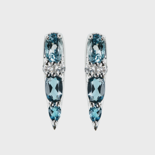 White gold stud earrings with white diamonds and london blue topazes