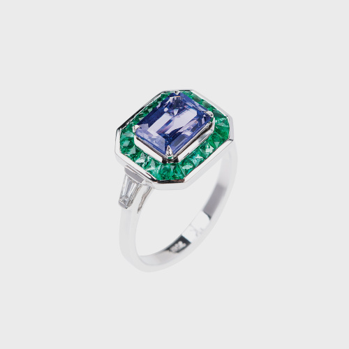White gold ring with tanzanite, emeralds and white diamond baguettes