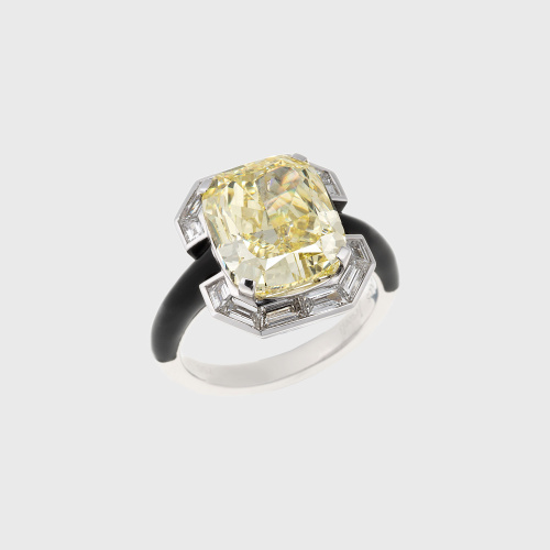 White gold ring with cushion yellow diamond, white diamond baguettes and black enamel